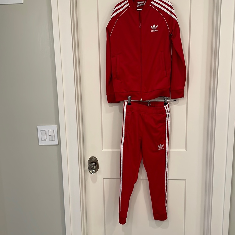 Red youth Adidas tracksuit size 7/8